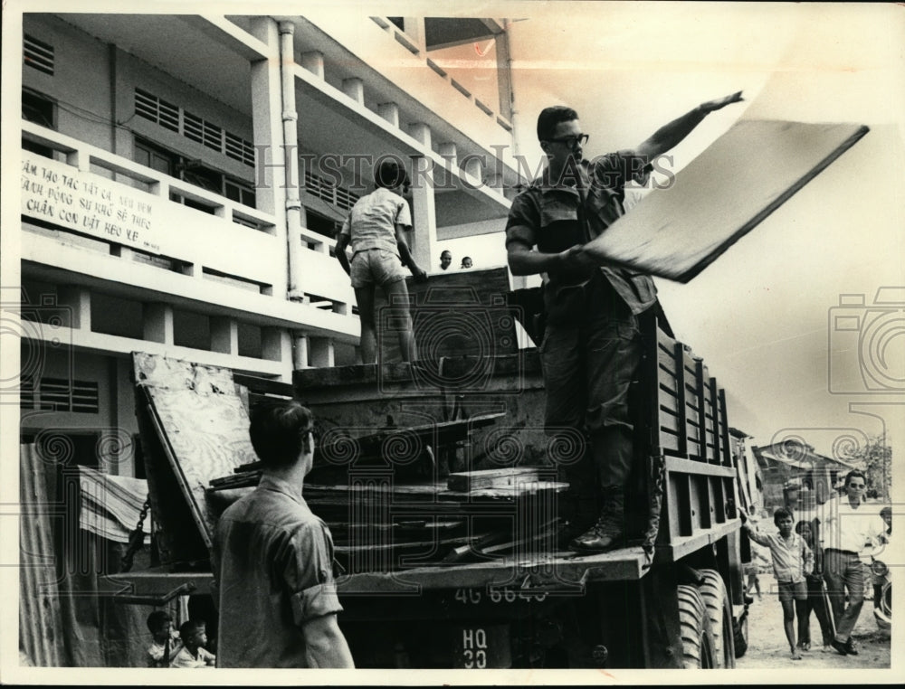 1968 Chapman unloading packing crates- Vietnam-Historic Images