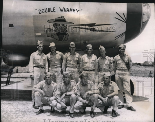1950 Press Photo Crew members of "Double Whammy" shown by their ship - cvb38032-Historic Images