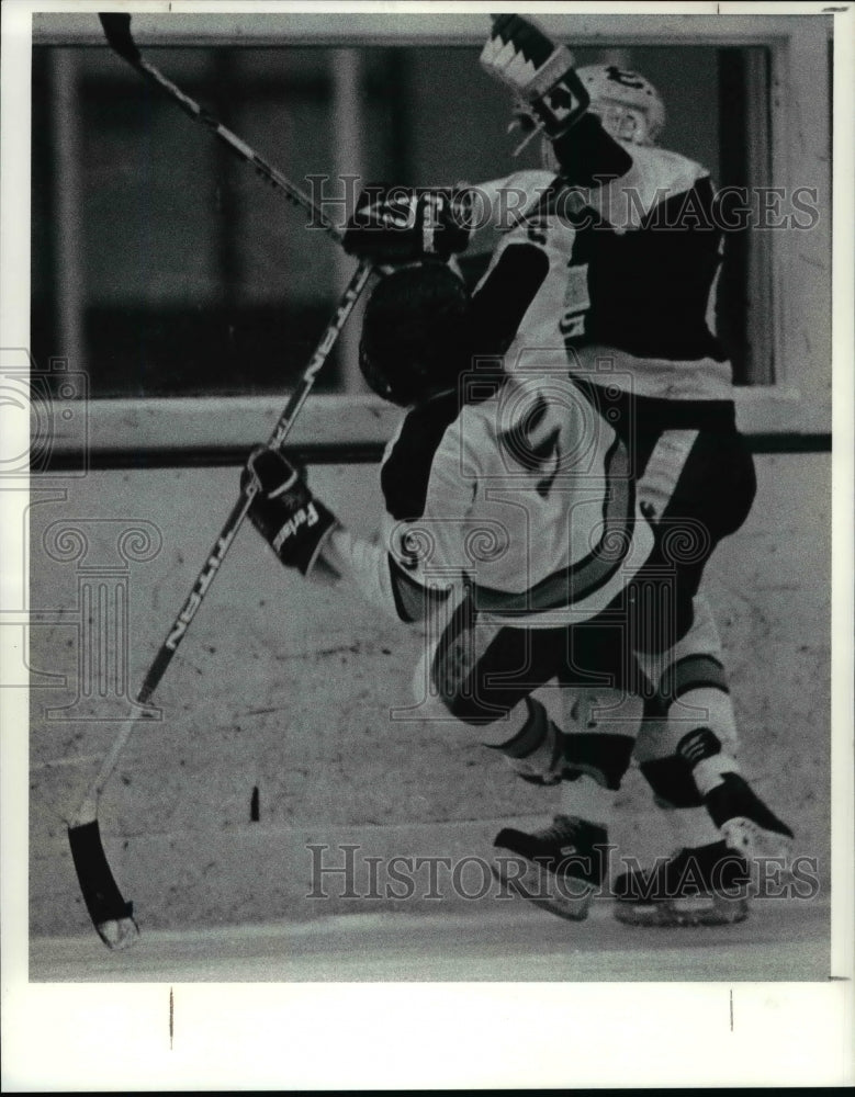 1990 Press Photo Jim Drellishak checks Mike Phillips During Open Night of Hockey - Historic Images