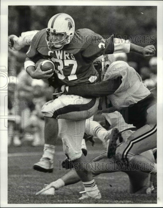 1983 Press Photo Spartan junior, Jim Donnelly high steps his way to a record day - Historic Images