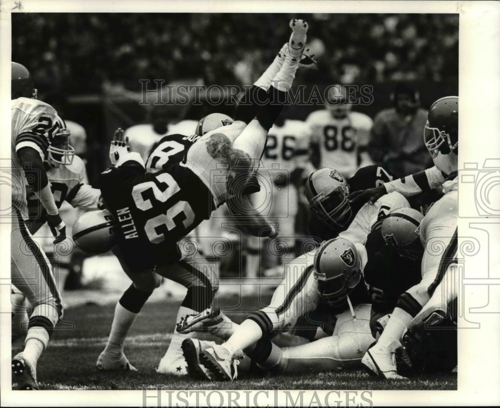 Los Angeles Marcus Allen jumps over center for a three yard gain-Historic Images