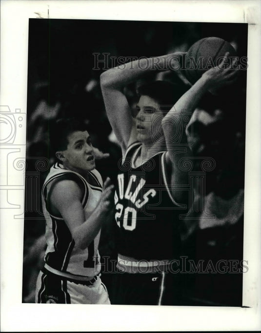 Press Photo Buckeye's Ted Stout passes around Brookside's Brent Schremp - Historic Images