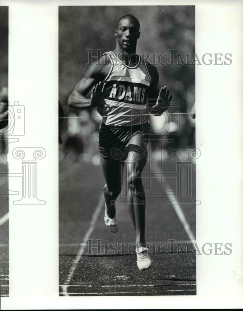 1987 Press Photo Anthony Morgan of John Adams crosses the finish line- Historic Images