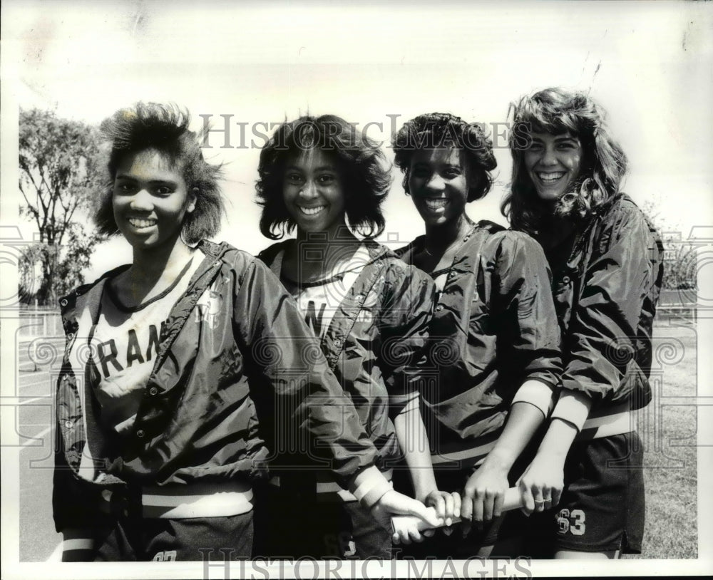 1986 Press Photo Marlo Merchant with Orange High School Sprint Relay Team. - Historic Images