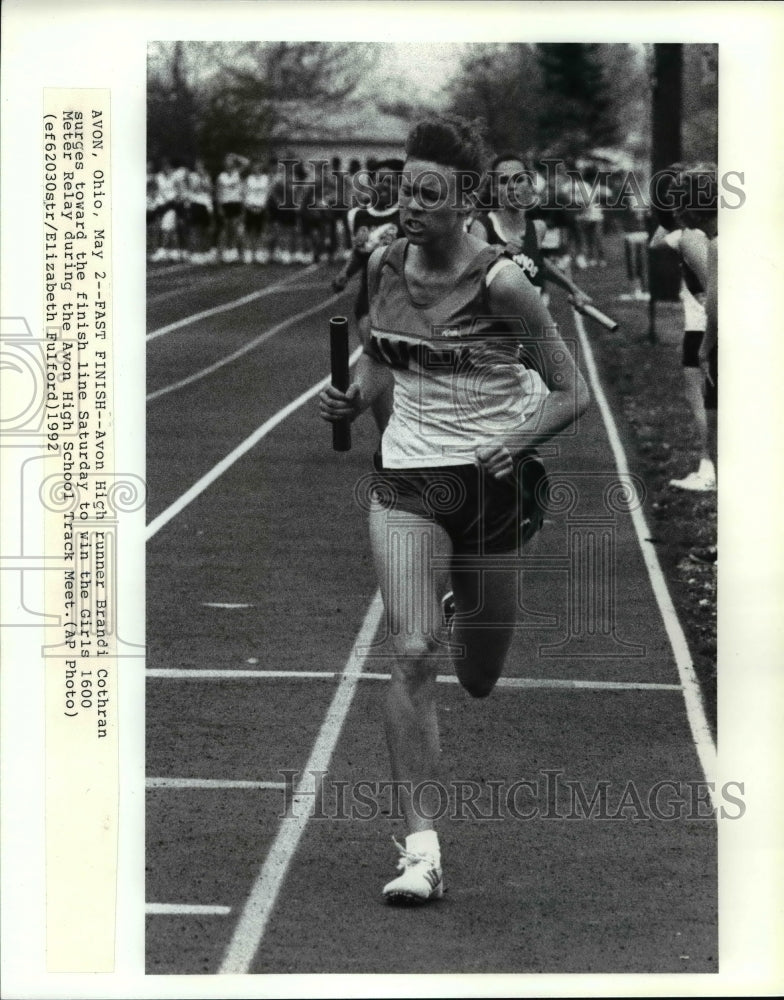 1992 Press Photo Brandi Cothran wins 1st place 1600 meter relay, Avon High, Ohio - Historic Images