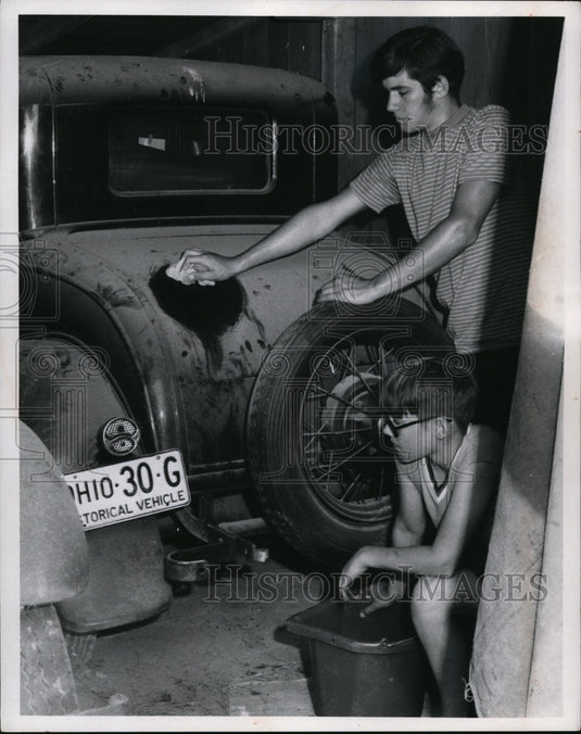1969 Press Photo David and Dan Mare clean up a 1931 Ford - cvb43961 - Historic Images