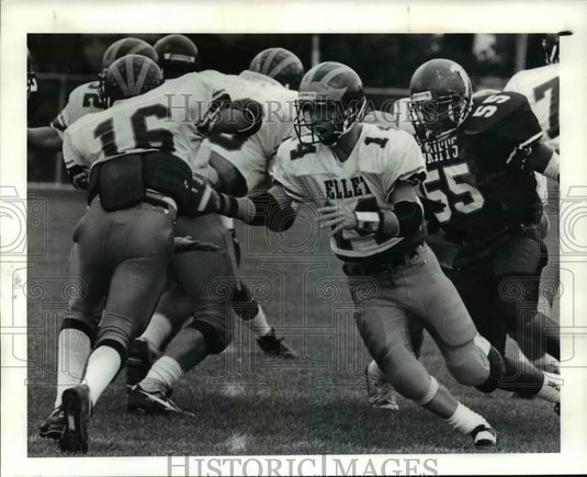 1991 Press Photo 14. Ryan George Hands off to Bob Clark 16 - cvb47715- Historic Images