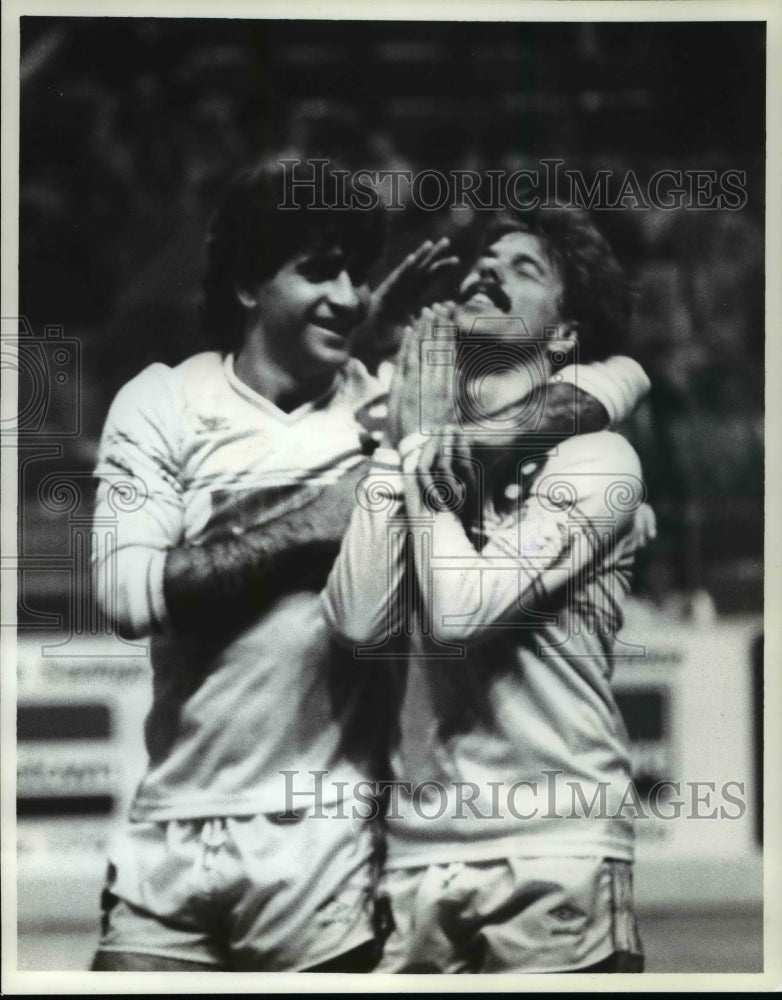 Press Photo Thanking the goal to god is Peter Ward (R) with Ali Kazameni - Historic Images
