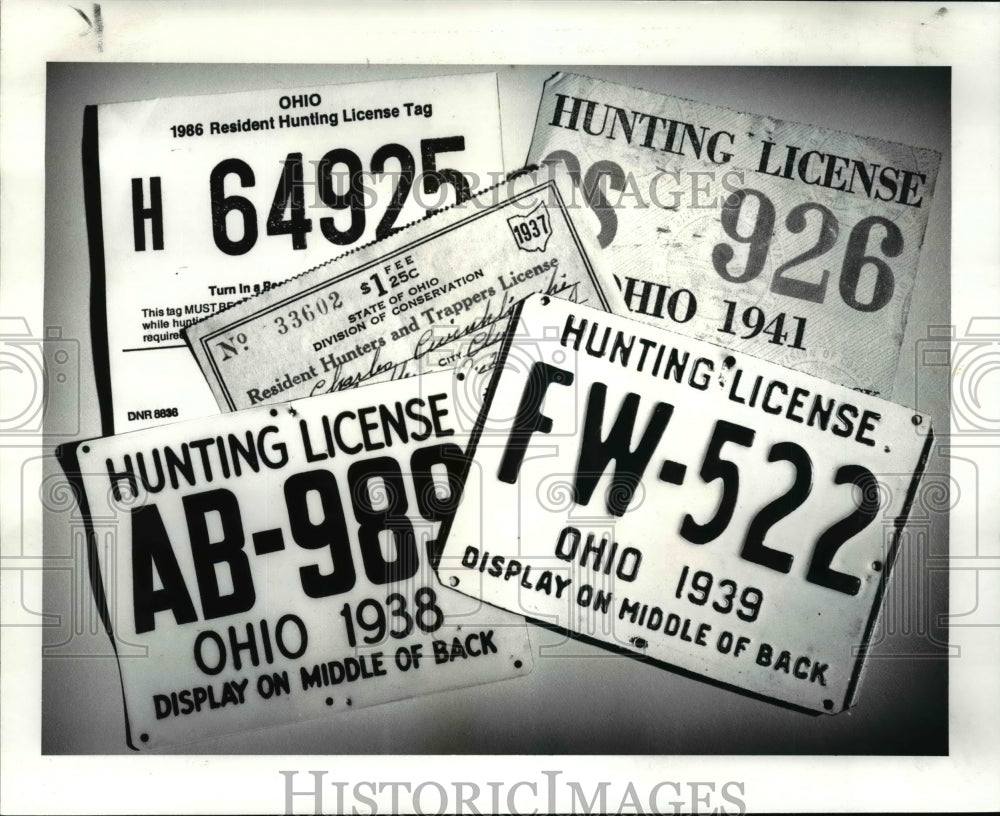 1986 Press Photo Ohio Hunting Licenses Past and Present - cvb50078 - Historic Images