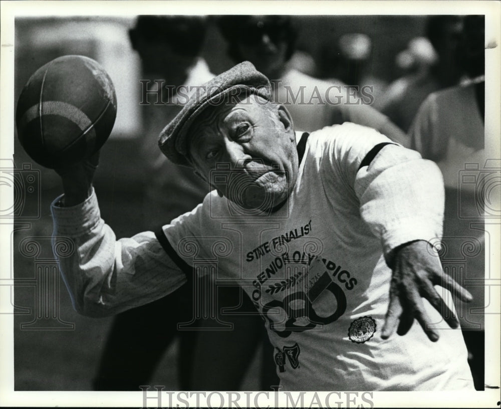 Press Photo Anthony Slazas-football throw event, Ohio Senior Olympics - Historic Images