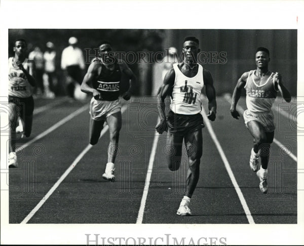 1991 Press Photo Jonathan Burrell of John Marshall High during 100m me ...