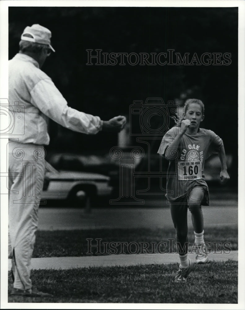 1991 Press Photo 12 year old Angela Serrani of Olmsted Falls ran 6.2K relay - Historic Images