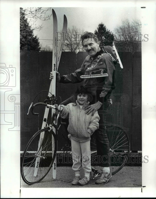 1987 Press Photo Dominic Vadina and Stephanie Stevelak with bike, skates & skis. - Historic Images