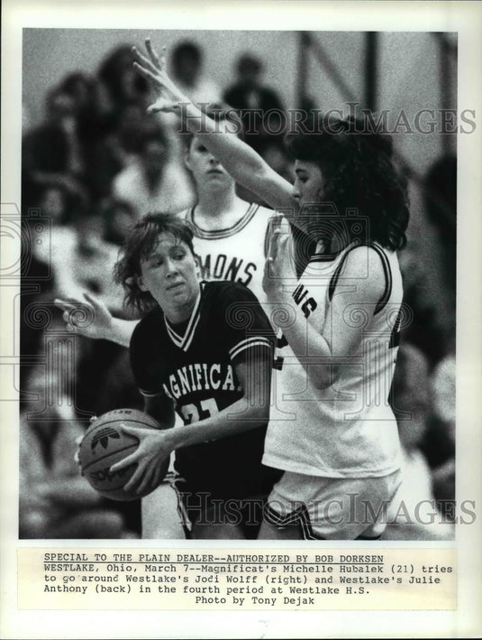 Press Photo Magnificat's Michelle Hubalek (21) tries to go around Westlake's - Historic Images