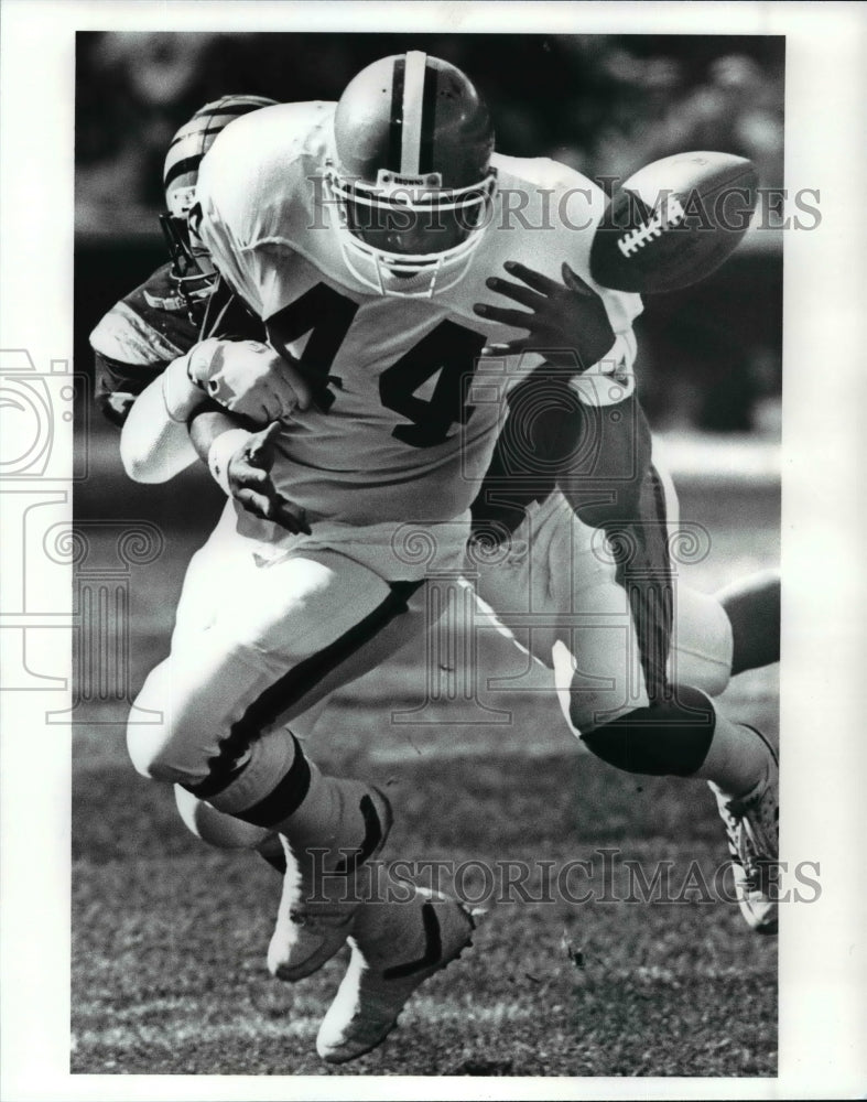 1988 Press Photo Earnst Byner vs Reggie Williams-football playoffs - cvb53861 - Historic Images