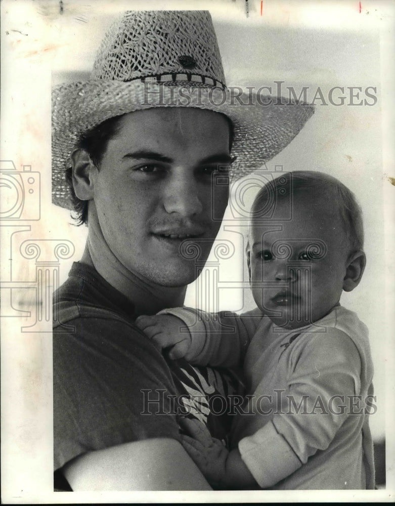 Cleveland Indians Joe Charboneau feeding his 11-month old son Tyson News  Photo - Getty Images