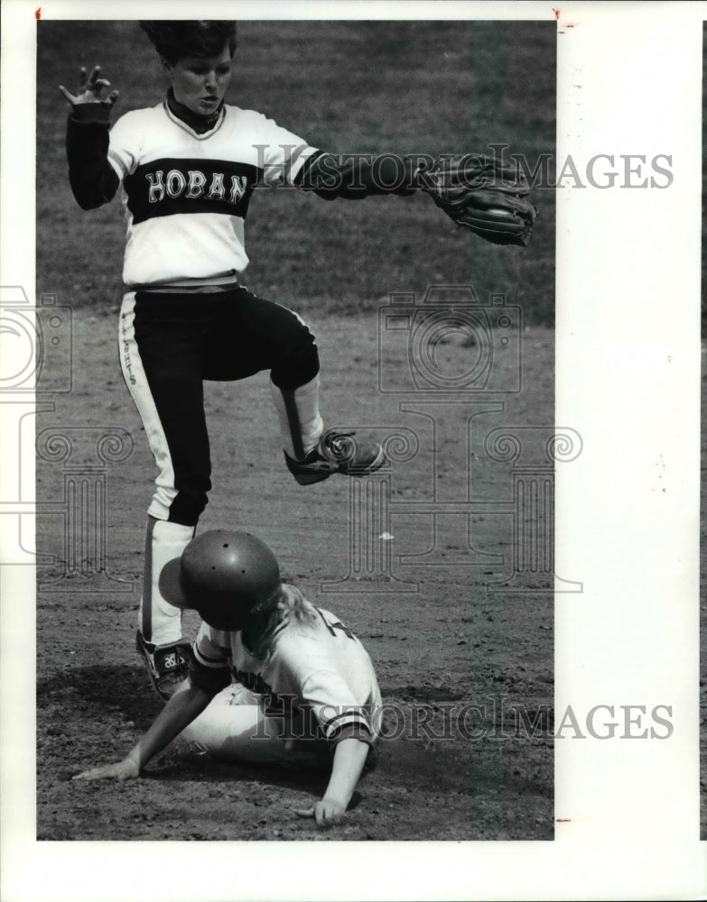 Press Photo Meghanne Anderson leaps over Karen Cook during game - cvb56058- Historic Images
