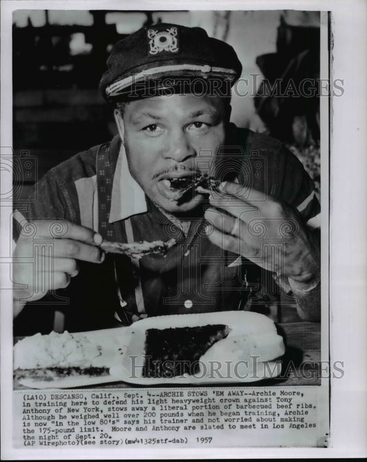 1957 Press Photo Archie Moore to defend his light heavyweight crown against Tony - Historic Images