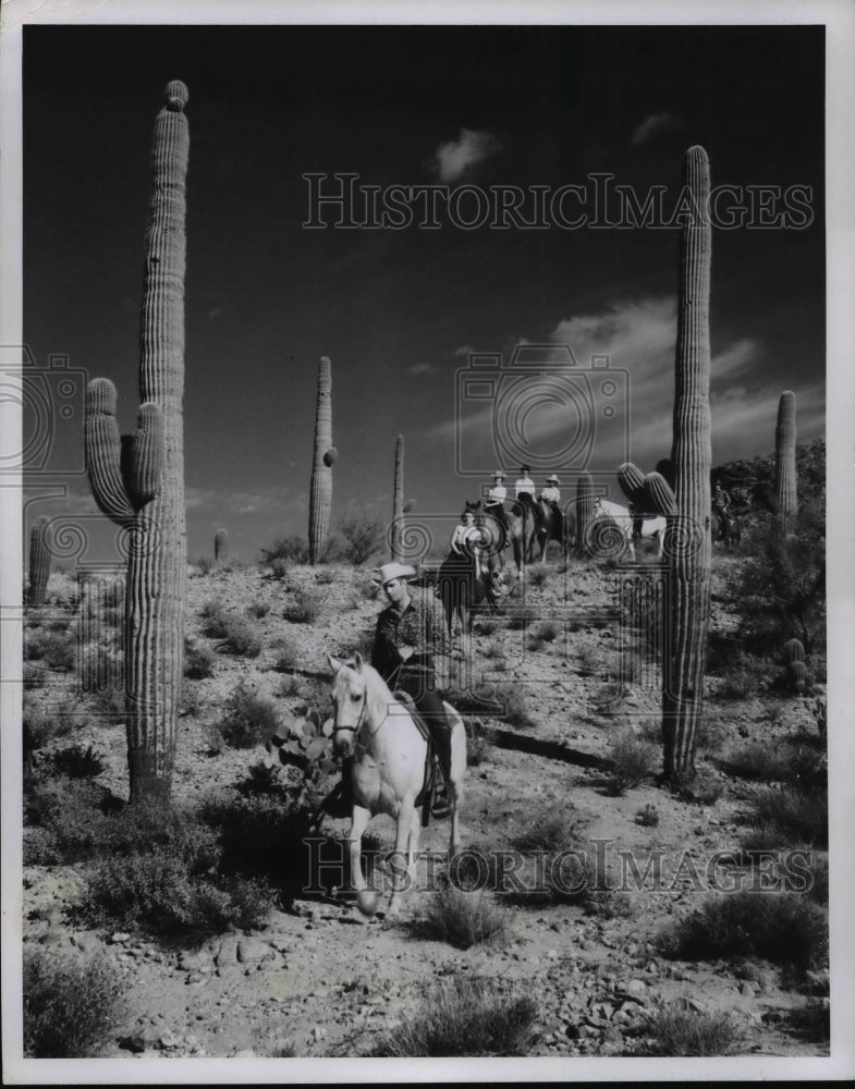 Press Photo Horseback riding down a trail in Arizona - cvb59452 - Historic Images