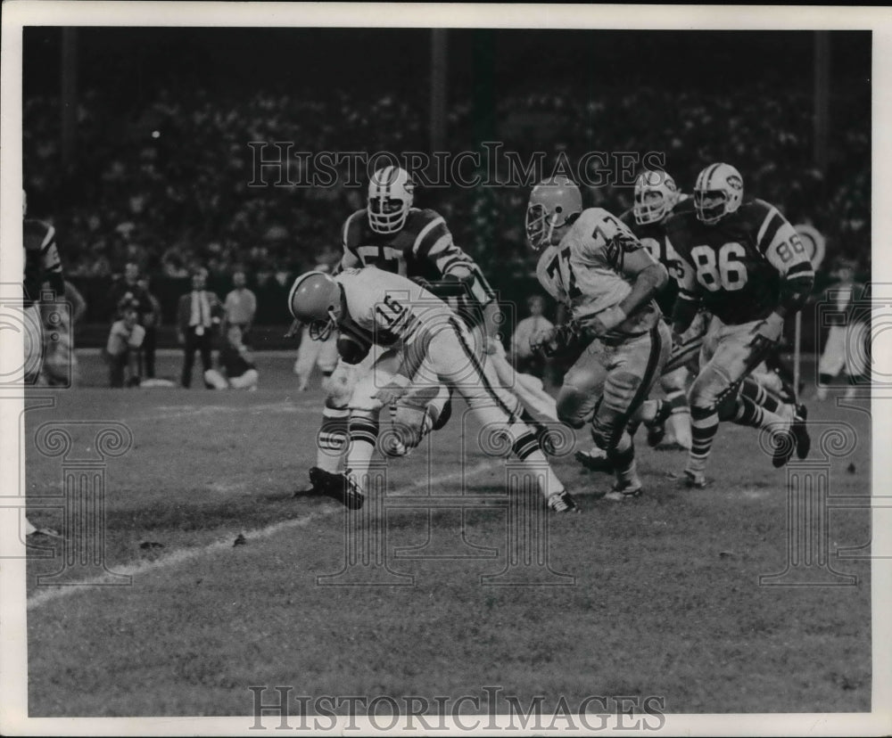 1970 Bill Nelsen is harnessed by jets Line in first Down at Stadium.-Historic Images