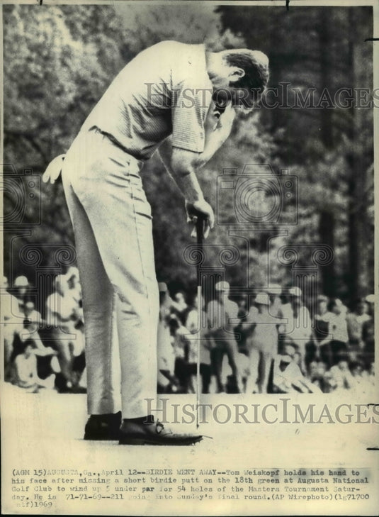 1969 Tom Weiskopf holds his hand to his face after missing a putt-Historic Images