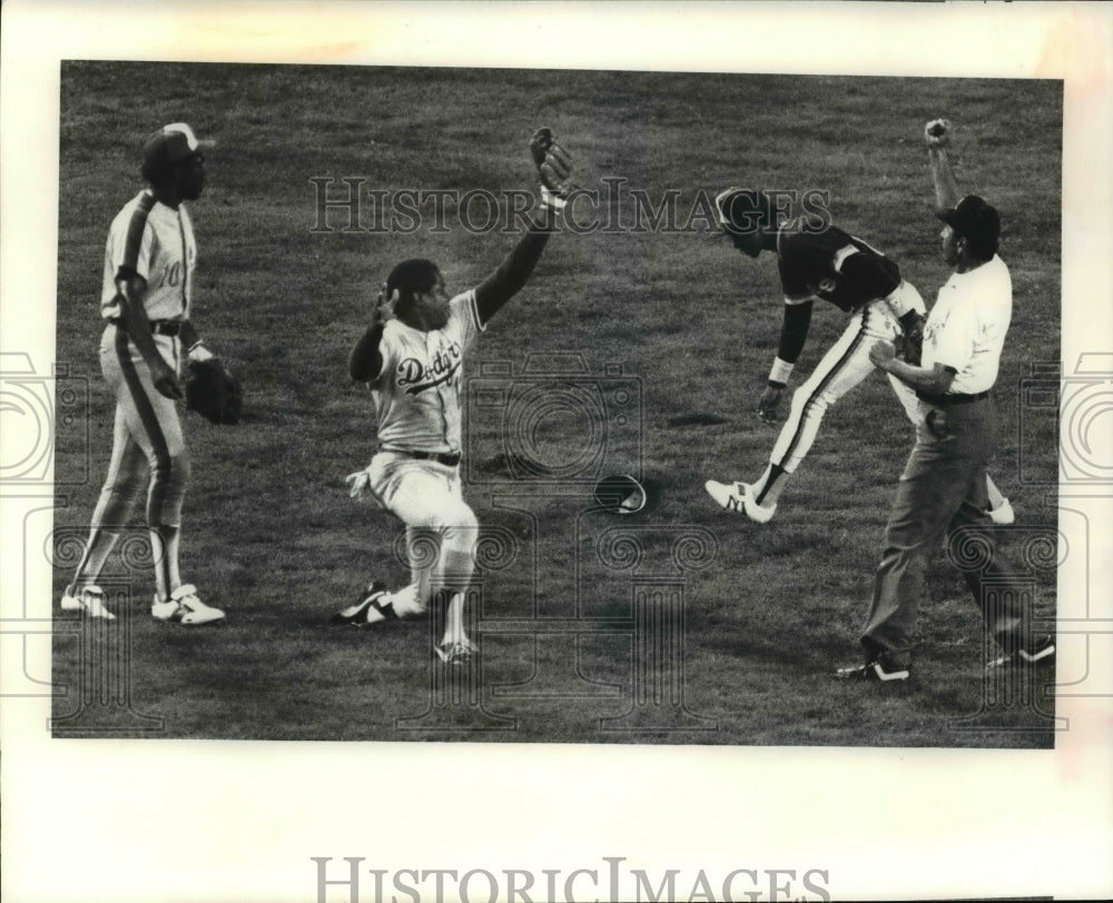 Press Photo Umpire Calls and Out as Dodger Player Attempts Out - cvb62511 - Historic Images