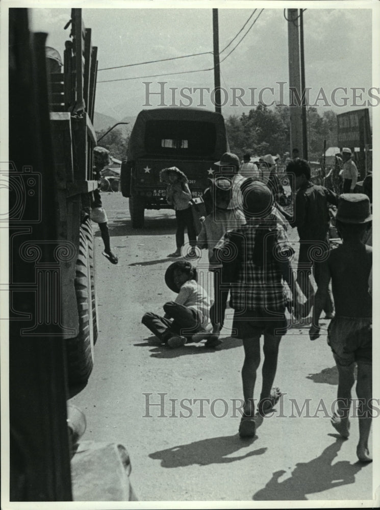 1968 Press Photo One youngster falls or was pushed from trucks as it gains speed - Historic Images