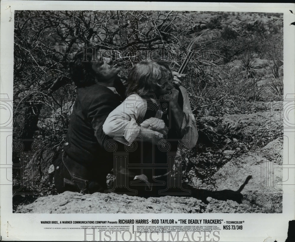 Press Photo Richard Harris and Rod Taylor star in The Deadly Trackers - Historic Images