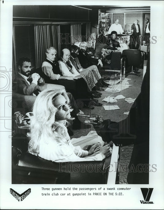 Press Photo Three gunmen hold passengers at gunpoint in PANIC ON THE 5:22 - Historic Images