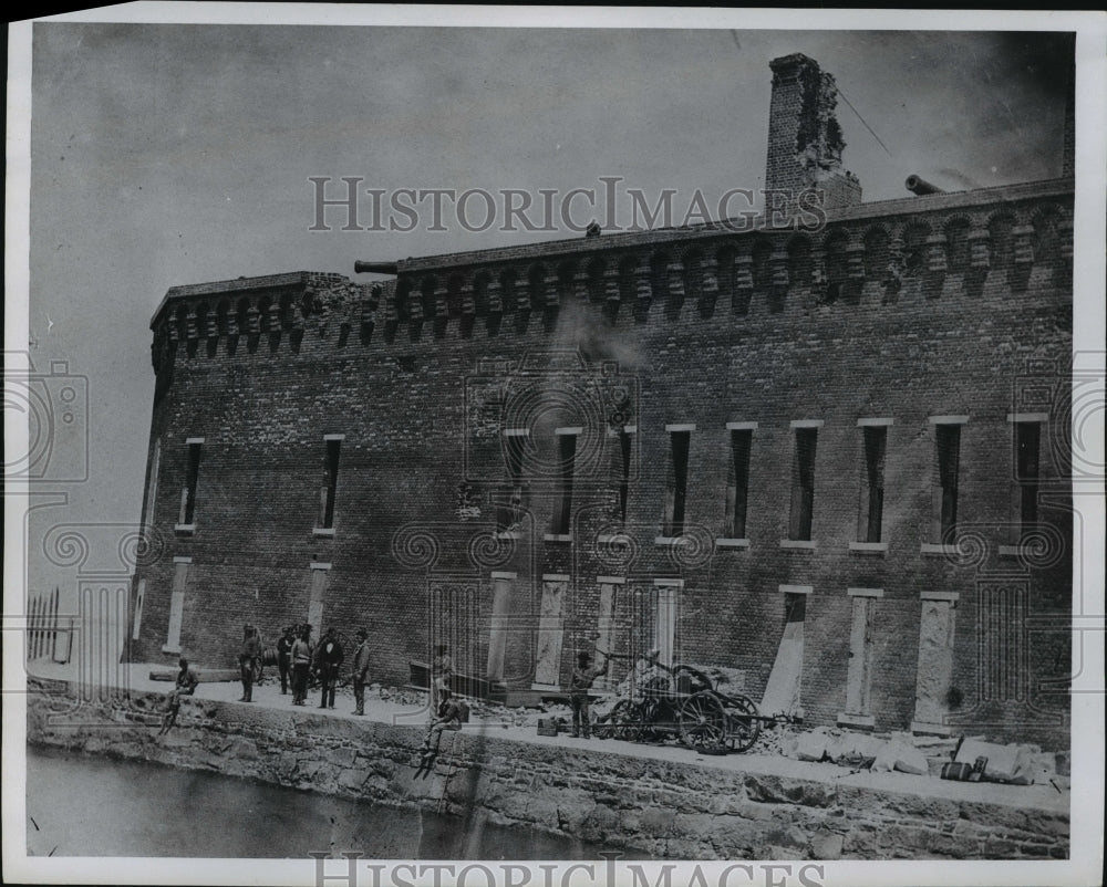 1966 Press Photo Civil War Scene of Men Standing By Damaged Building - cvb75495 - Historic Images