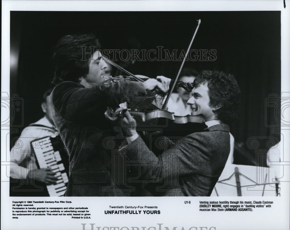 1989 Press Photo Dudley Moore and Armand Assante star in Unfaithfully Yours - Historic Images