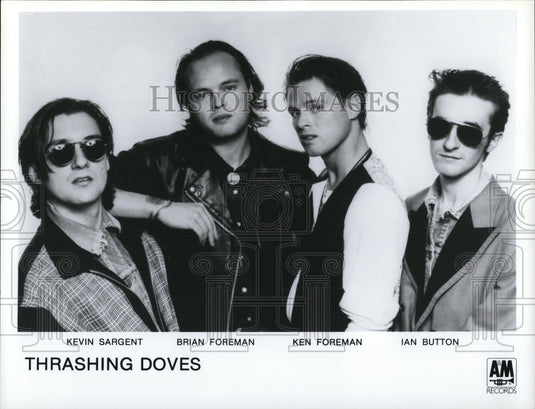 1989 Press Photo Thrashing Doves - cvp32772 - Historic Images
