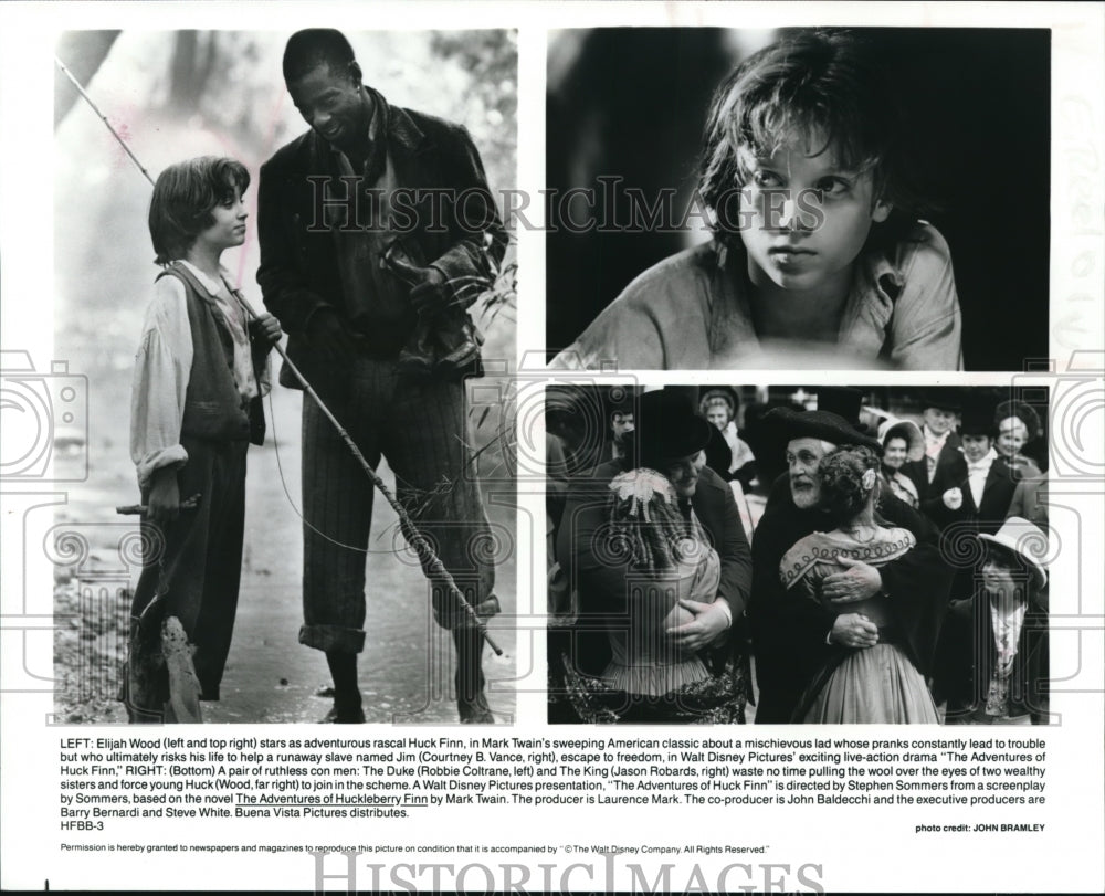 1993, Elijah Wood Jason Robards in The Adventures of Huck Finn - Historic Images
