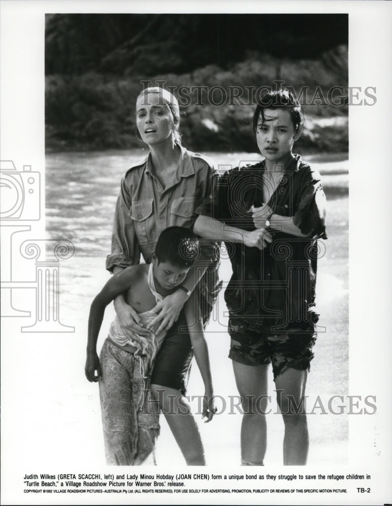 1993, Greta Scacchi and Joan Chen in Turtle Beach - cvp37173 - Historic Images