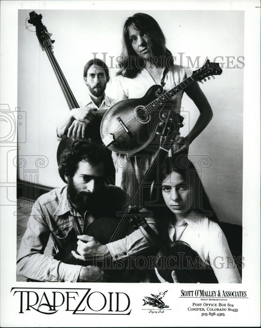 1985 Press Photo Trapezoid Music Group - cvp38725- Historic Images