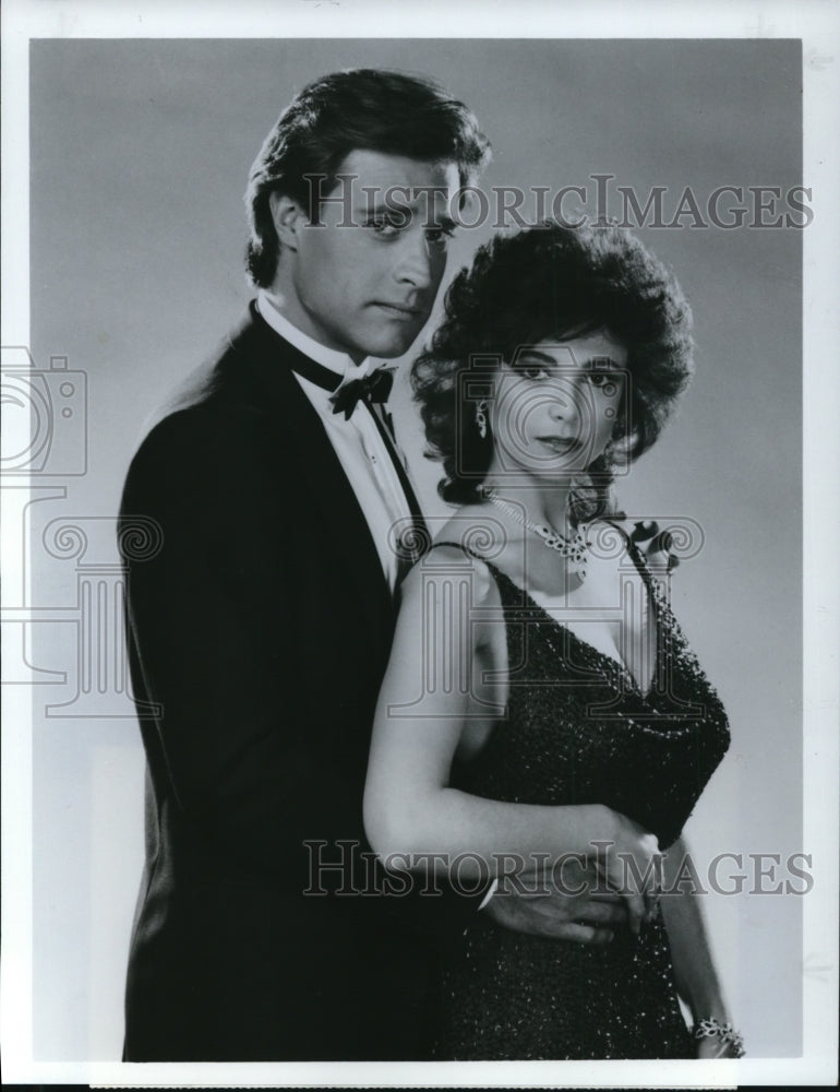 1985, John James and Emma Samma in Dynasty II - cvp43470 - Historic Images