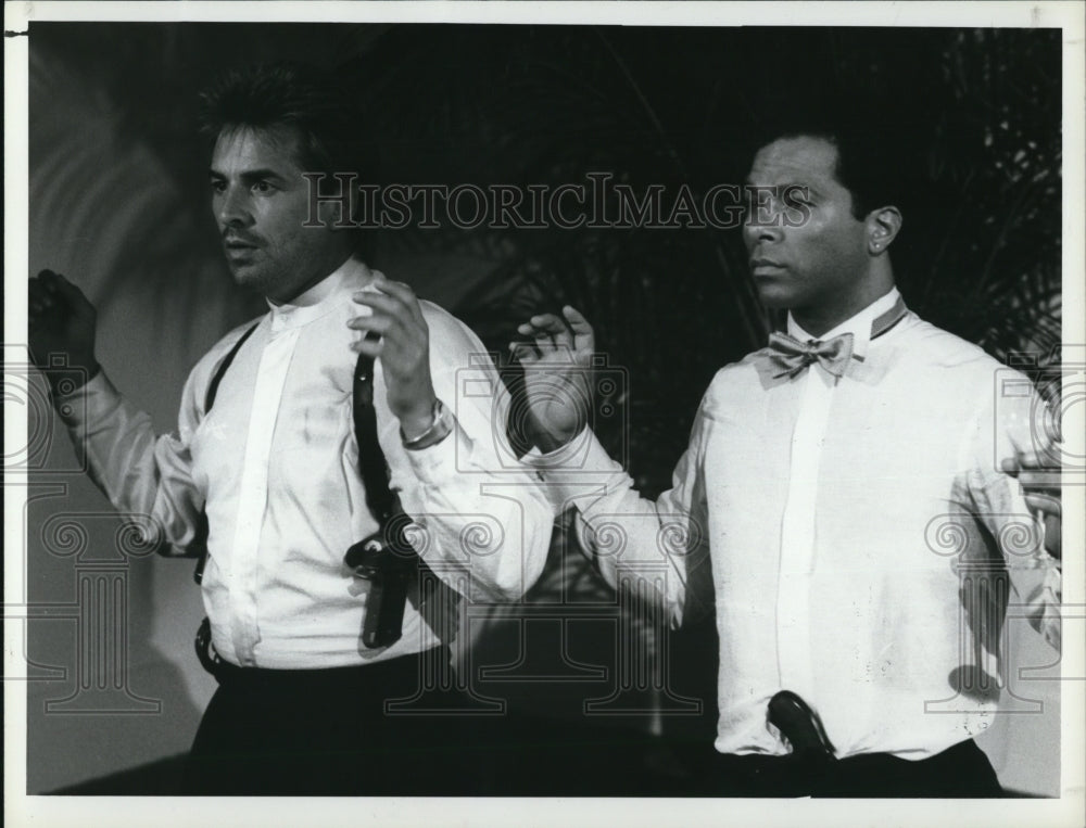 1987 Don Johnson and Philip Michael Thomas star in Miami Vice - Historic Images