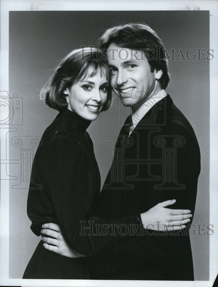 1984 Mary Cadorette and John Ritter star in Three's a Crowd - Historic Images