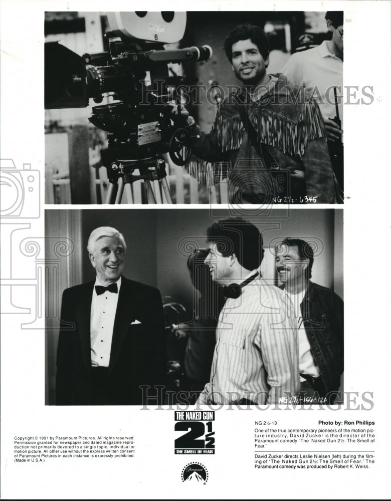 1991, David Zucker Leslie Nielsen on set of Naked Gun 2 1/2 - Historic Images