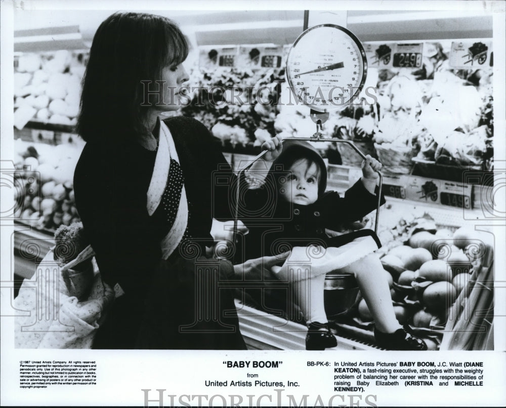 1987 Diane Keaton and Kristina Michelle Kennedy in Baby Boom - Historic Images