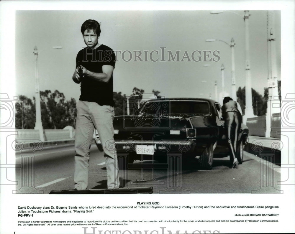 Press Photo Timothy Hutton and Angelina Jolie star in Playing God - cvp67144-Historic Images