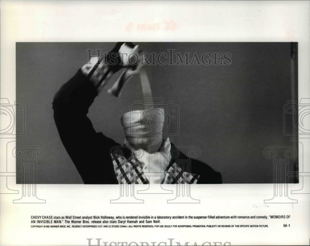 1992, Chevy Chase as Nick Halloway in Memoirs of an Invisible Man - Historic Images