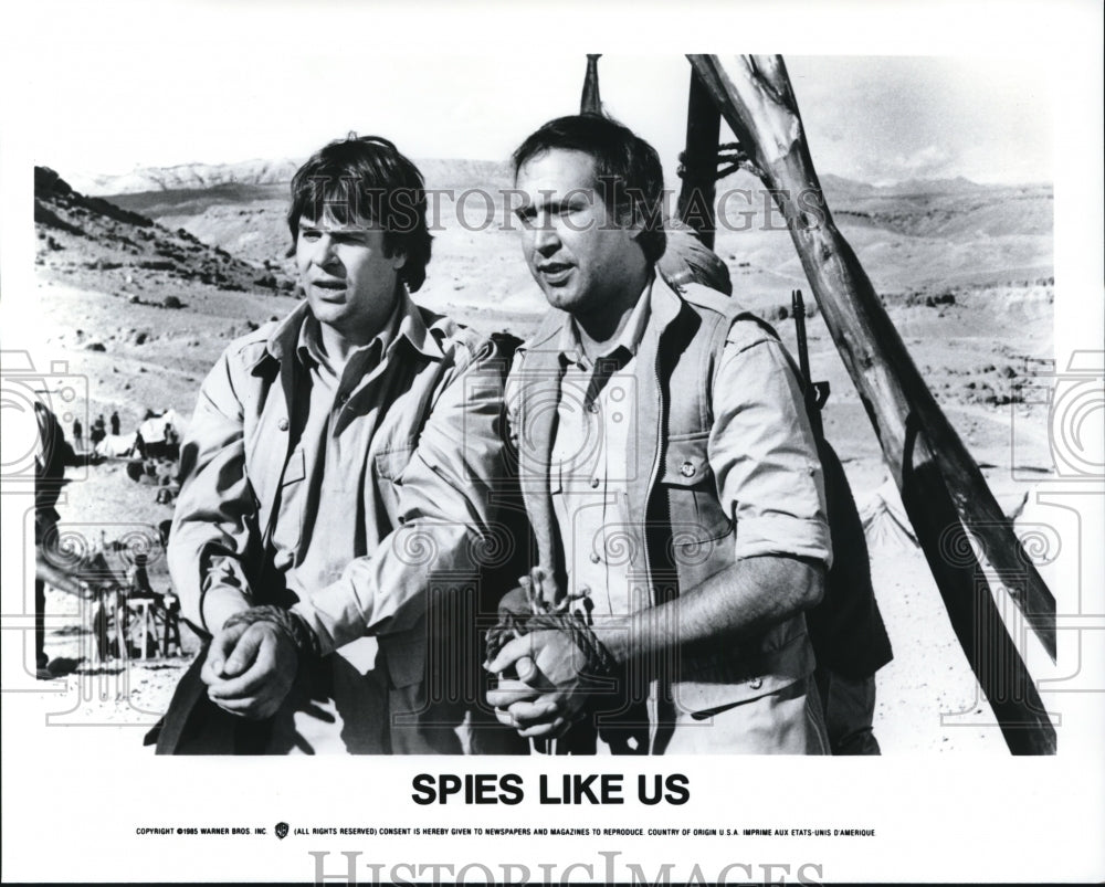 1985 Chevy Chase, Dan Aykroyd in Spies Like US  - Historic Images