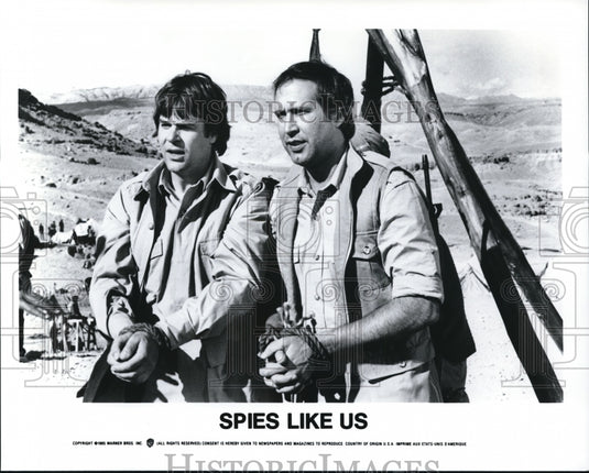 1985 Chevy Chase, Dan Aykroyd in Spies Like US  - Historic Images