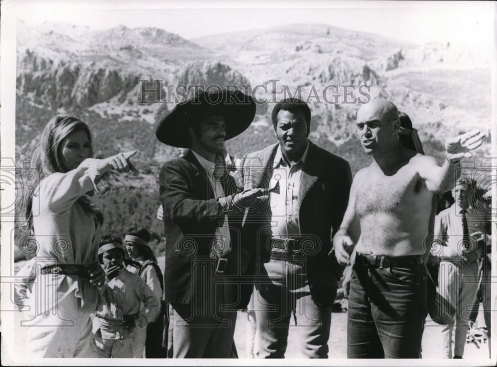 1969 Raquel Welch & Burt Reynolds in 100 Rifles - Historic Images