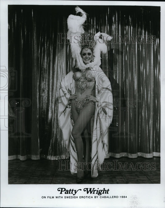 1984, Patty Wright on film with Swedish erotica by Caballero. - Historic Images