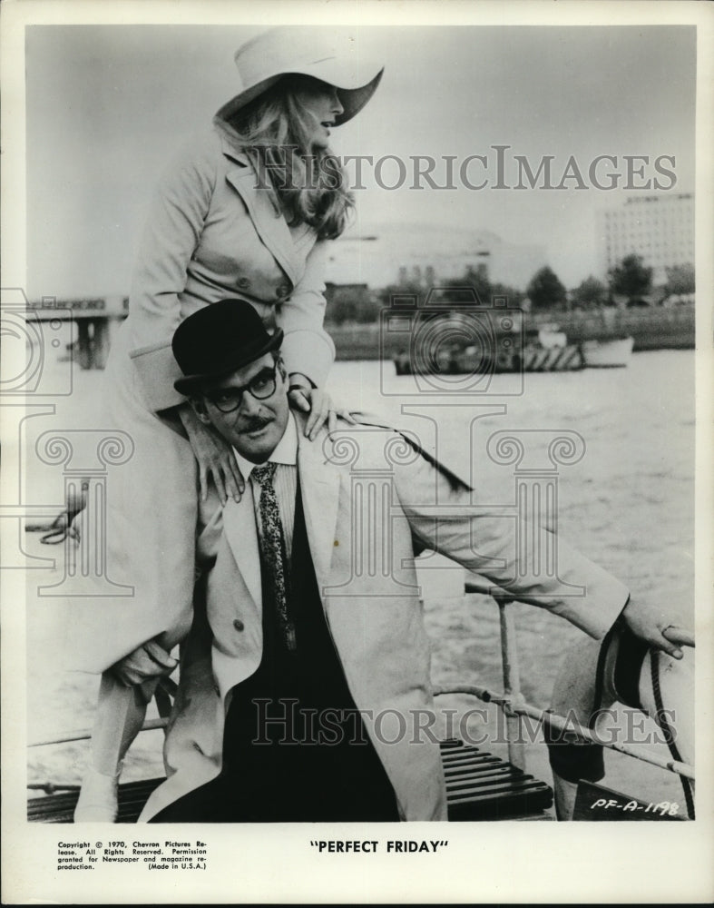 1970, Ursula Andress and Stanley Baker in Perfect Friday. - cvp81356 - Historic Images