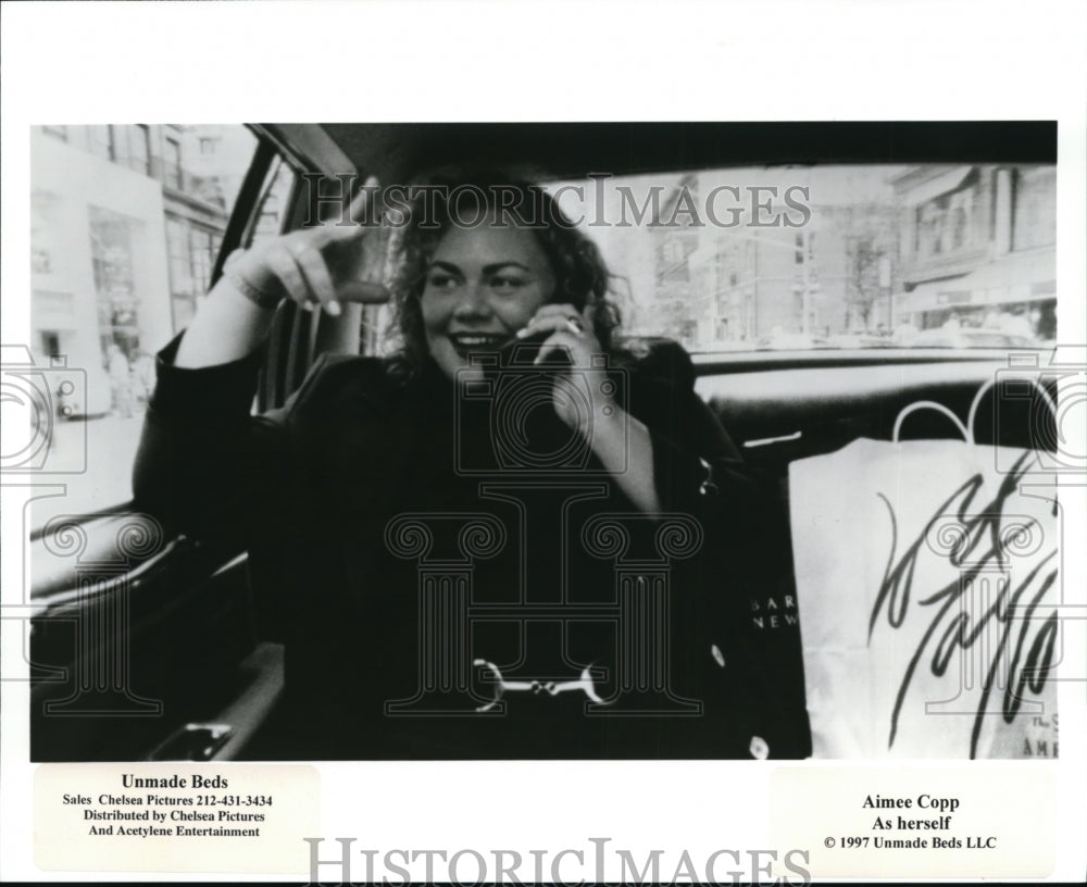 1997 Press Photo Aimee Copp in Unmade Beds. - cvp83893 - Historic Images