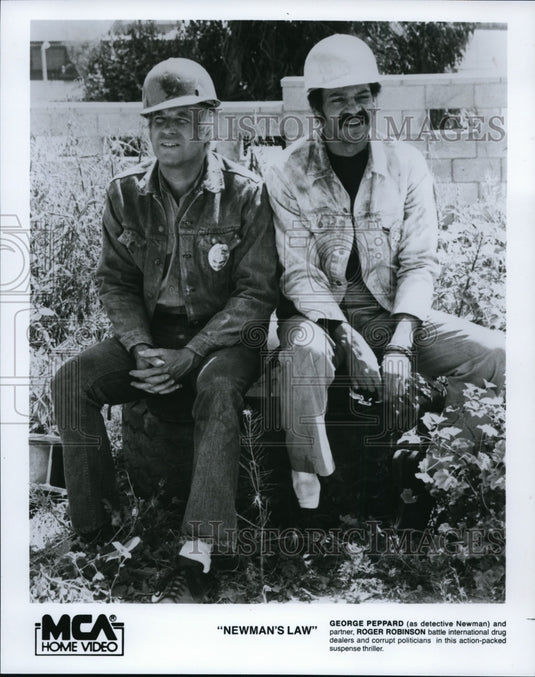 1986, George Peppard and Roger Robinson in Newman's Law. - cvp87937 - Historic Images