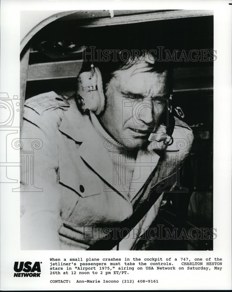 1980, Charlton Heston in Airport 1975. - cvp88001 - Historic Images